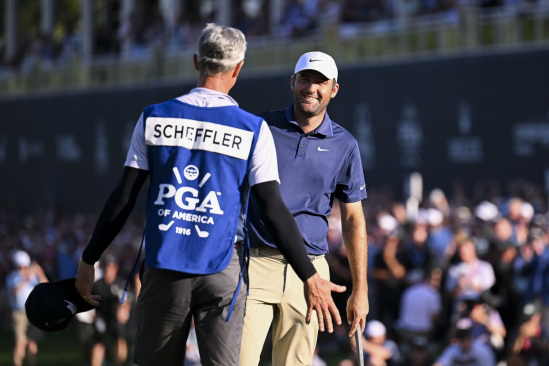 Scottie Scheffler a jeho kedík Ted Scott (foto: GettyImages).