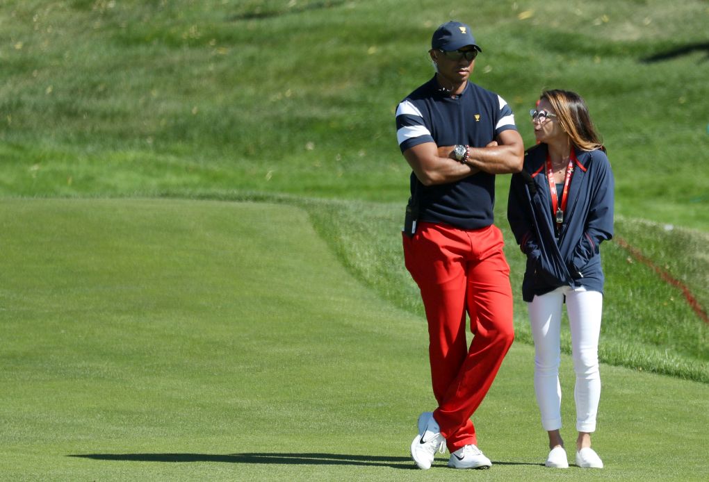 Erica Herman a Tiger Woods