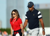 Erica Herman a Tiger Woods