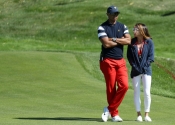 Erica Herman a Tiger Woods