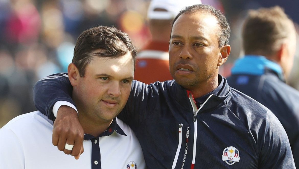 Patrick Reed a Tiger Woods