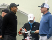 Tiger Woods a Davis Love III.